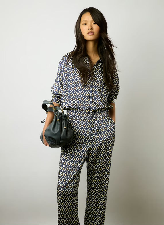 Woman carrying Miami Bag slate blue leather street style
