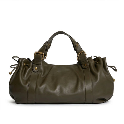 Woman carrying Miami Bag chestnut leather street style
