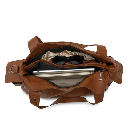Brown leather duffel bag with organized interior for travel essentials