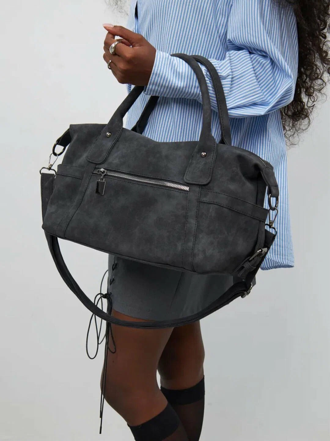 Woman carrying LA Bag anthracite black leather denim outfit
